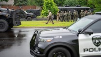 An image of police gathered near the location of a fatal shooting of lawmakers in Minnesota.